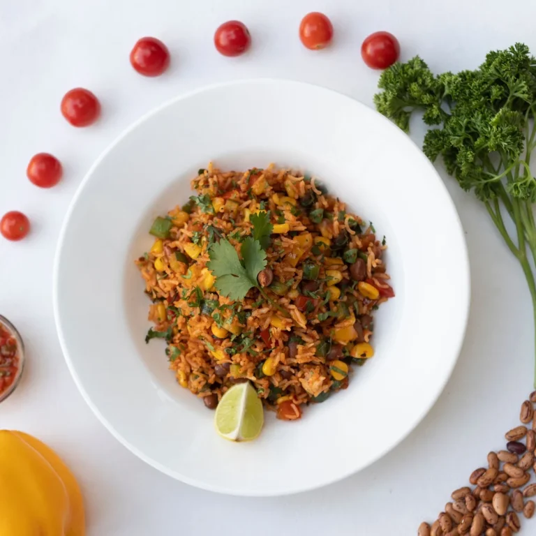 A pot of fluffy red Mexican rice with separate grains