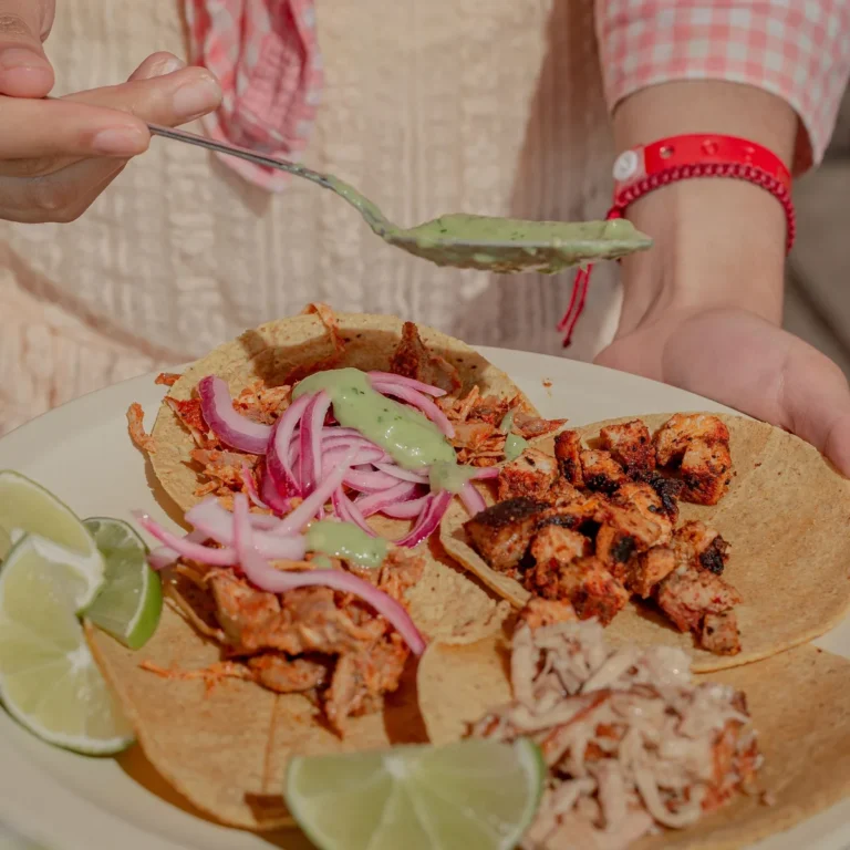 Crispy shredded pork carnitas with crisp edges on a plate